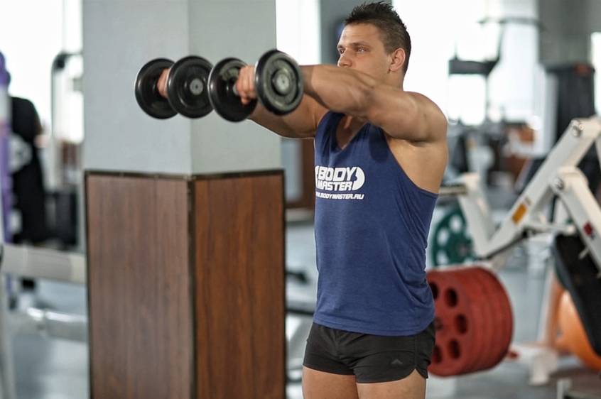 Тяга гантелей к подбородку: техника выполнения, какие мышцы работают