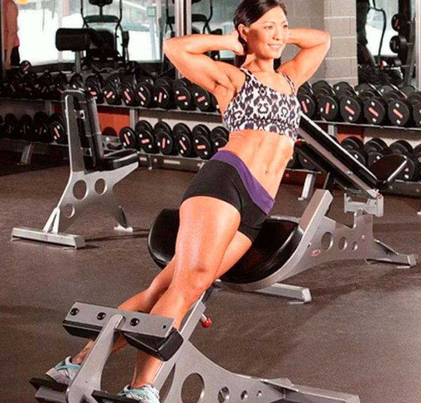 Скручивания на пресс на тренажере: техника, процесс и подходы