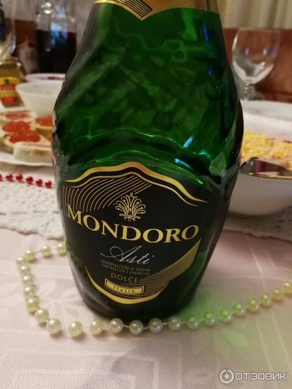Бутылка шампанского мондоро. Мондоро Асти напиток. Игристое вино Asti "Mondoro". Мондоро белое полусладкое. Мондоро Асти Дольче вкус.